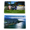 A flat USB drive featuring images of Cairns and the Tropical North Queensland Institute of TAFE, with various colours.