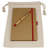 A drawstring bag in natural colour containing a brown journal book with a red elastic band and a red pen.