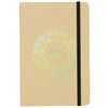 A tan A5 journal with a black elastic band, featuring a circular design and green graphics related to sustainability.