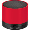 A red cylinder Bluetooth speaker with a black mesh top and a switch at the base. It features a logo on the body.