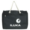 A black waterproof beach bag with a rope handle and a zip pocket, featuring a logo on the front.