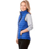 A women's vest in bright blue, featuring a zip front and a high collar, with a logo on the chest.