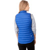 A woman wearing a blue puffer vest, featuring a high collar and a fitted design, viewed from the back.