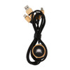 A charging cable in black with bamboo accents and a round base featuring a logo. It has multiple connectors.