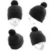 A black beanie with a pom-pom on top, displayed from different angles on a clear mannequin head.