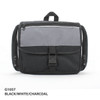 A toiletry bag in black with grey accents, featuring a front buckle and zippers, along with a handle on top.