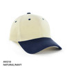 A two-tone cap in natural and navy colours, featuring a front peak and a logo.