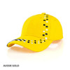 A yellow cap with a pattern of black and white squares along the brim and a logo.
