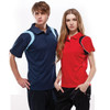 A navy blue polo shirt and a red polo shirt displayed on male and female models, both featuring contrasting accents and a logo.