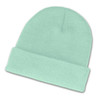 A mint green beanie with a folded cuff.