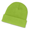 A vibrant green beanie made from soft, textured fabric, featuring a rolled cuff design.