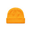 A vibrant yellow knitted beanie with a cuffed design and a textured pattern. It features a logo.