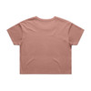 A cropped tee in a muted peach colour, featuring a simple design and a logo. The shirt has short sleeves and a relaxed fit.