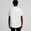 A white linen short-sleeve shirt displayed from the back, featuring a collar and a logo.