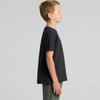 A youth t-shirt in faded black, displayed on a child from the side, with a logo visible.