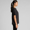 A black heavy faded T-shirt displayed on a model from the side, featuring a relaxed fit and a logo.