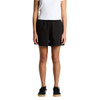 Black track shorts with a relaxed fit, featuring an elastic waistband and side pockets. Model is standing.
