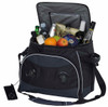 A black cooler bag with drinks and fruit inside, featuring speakers on the front and an attached device.