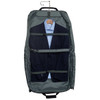 A green Transporter Garment Bag containing a formal suit and a blue shirt on a hanger. Features a logo.