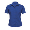 A blue button-up shirt for women with short sleeves and two chest pockets. It features a logo on the collar.