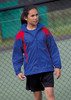 A blue jacket with red accents, featuring a front zip and a casual style, worn by a girl on a sports court.