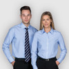 A blue button-up shirt for men and women, featuring a fitted design with long sleeves and a logo.