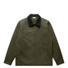 A green canvas jacket with a black corduroy collar and a chest pocket, featuring subtle branding.