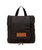 A dark brown toiletry bag with a textured exterior, featuring a top handle and a zip closure. It has a logo patch.