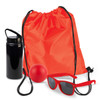 A drawstring bag in vibrant red, a black drink bottle, a red bouncy ball, and a pair of red sunglasses.