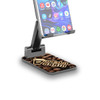 A foldable phone stand with a black and silver design, featuring a coffee-themed base and a logo on its surface.