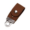 A brown PU leather flip drive with a silver metal clip and snap closure. It features a sleek design for storage.