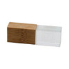 An Eco Crystal Flash Drive featuring a clear section and a bamboo casing, showcasing natural wood tones.