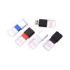 A set of four flash drives in black, blue, red, and white, each with a transparent casing and a logo.