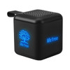 A black mini cube Bluetooth speaker with blue light accents and a logo on the side.