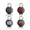 A set of keychains featuring different designs, including light-up engravings and coloured prints, with a round shape and metal ring.