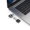 A silver Auto LED flash drive plugged into a laptop, featuring a sleek design and a logo.