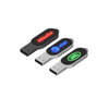 Three LED flash drives in black and silver, featuring logos on their sides in red and green illumination.