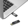 A black Jonah LED clip flash drive partially inserted into a laptop USB port, showcasing its sleek design.