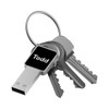 A metallic LED flash drive attached to a keyring, alongside three silver keys. The flash drive features a logo.