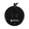 A circular black wireless charging sound lamp with a visible logo. The design is sleek and modern.