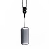 A sleek black and silver wireless speaker, with a hanging strap for easy attachment. It features a logo.
