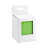 A green speaker in a white box with a transparent front panel, featuring a hanging tab at the top.