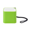 A green square speaker with a textured top and a black strap attached. It has a logo on one side.