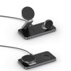 A black 15W 3-in-1 magnetic wireless charging station with a sleek design for various devices. It features a stand and multiple charging pads.