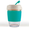 A reusable coffee cup with a teal silicone band and a light-colored lid, featuring a straw. It has a logo on the side.