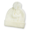 A white knitted beanie with a pom pom on top and a ribbed cuff. It has a branding logo.