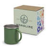 A green coffee mug with a stainless steel rim, accompanied by a floral-patterned box featuring a logo.