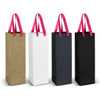 A collection of four tall paper bags in gold, white, black, and dark grey, each with pink ribbon handles.