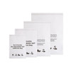 A set of four white biodegradable self-adhesive bags of varying sizes, featuring a logo and eco-friendly symbols.