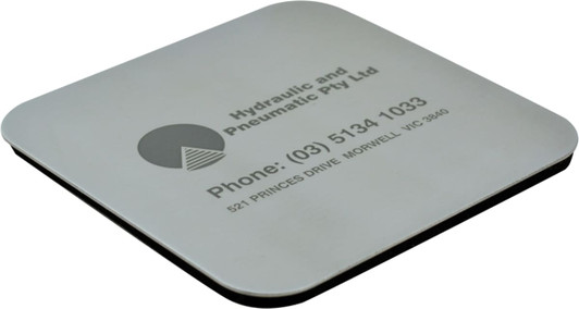 A square metallic coaster featuring a logo and contact information, with a black underside.
